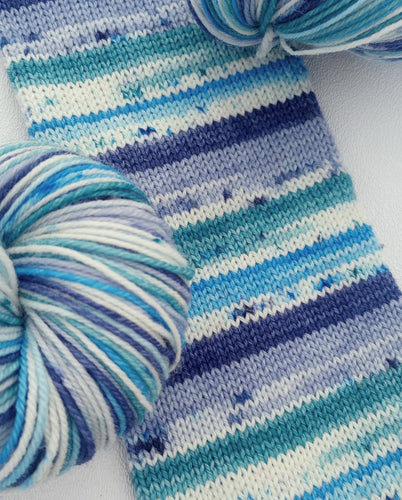 Accumulating Snow - Self Striping Sock Yarn