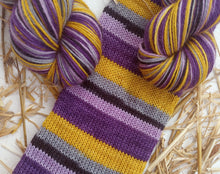 purple and yellow knit sock tube