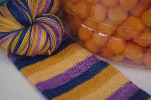 This is a Cheeseball Yarn - Self Striping Sock Yarn